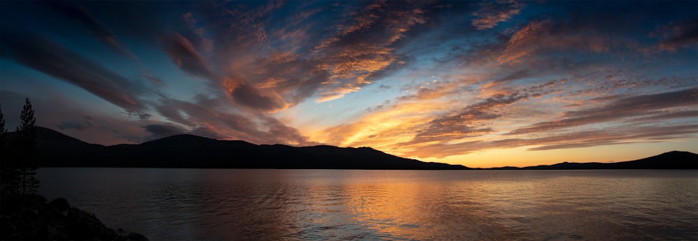 a sunset over a lake