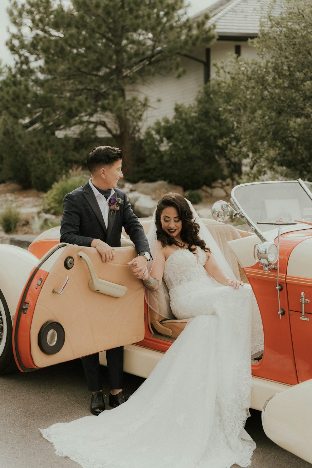 a man and woman in wedding attire