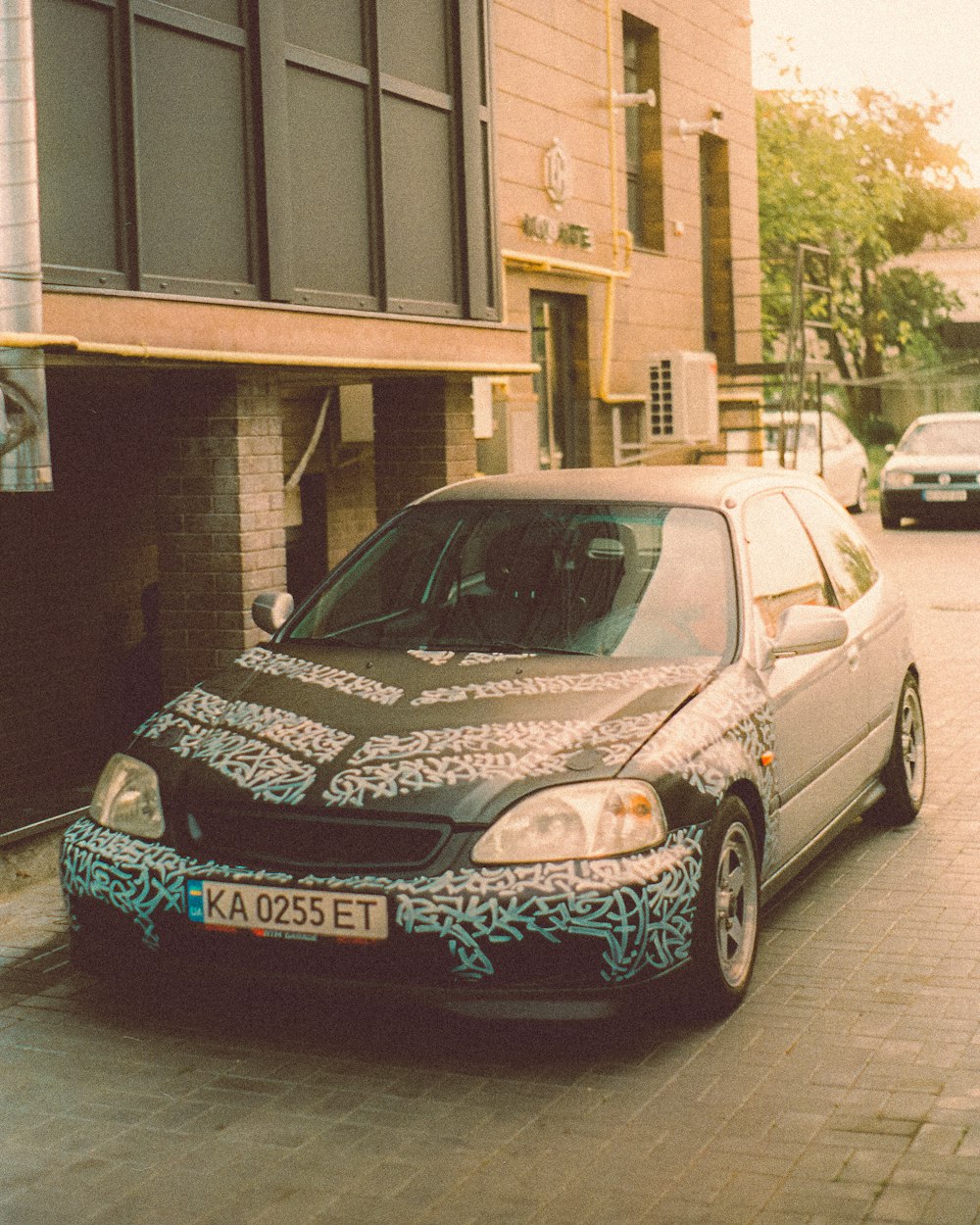 a car parked on the side of a street