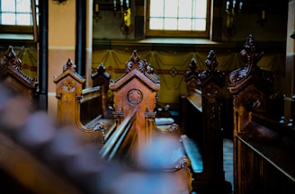 a room with a mirror and statues