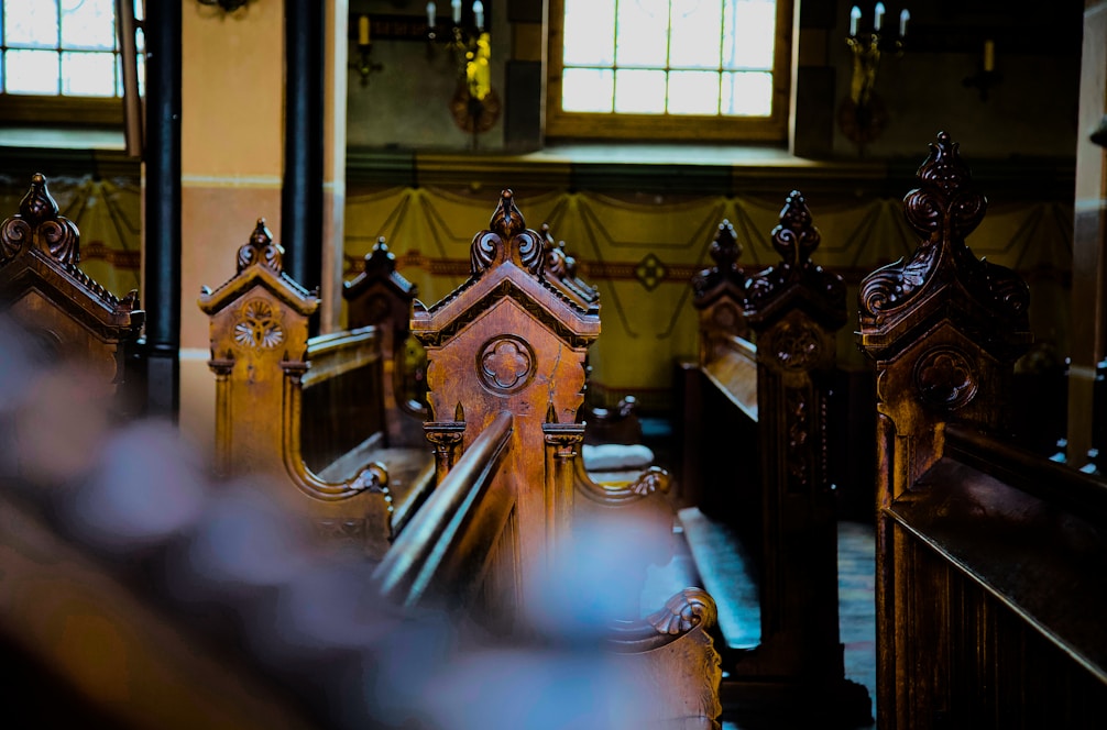 a room with a mirror and statues