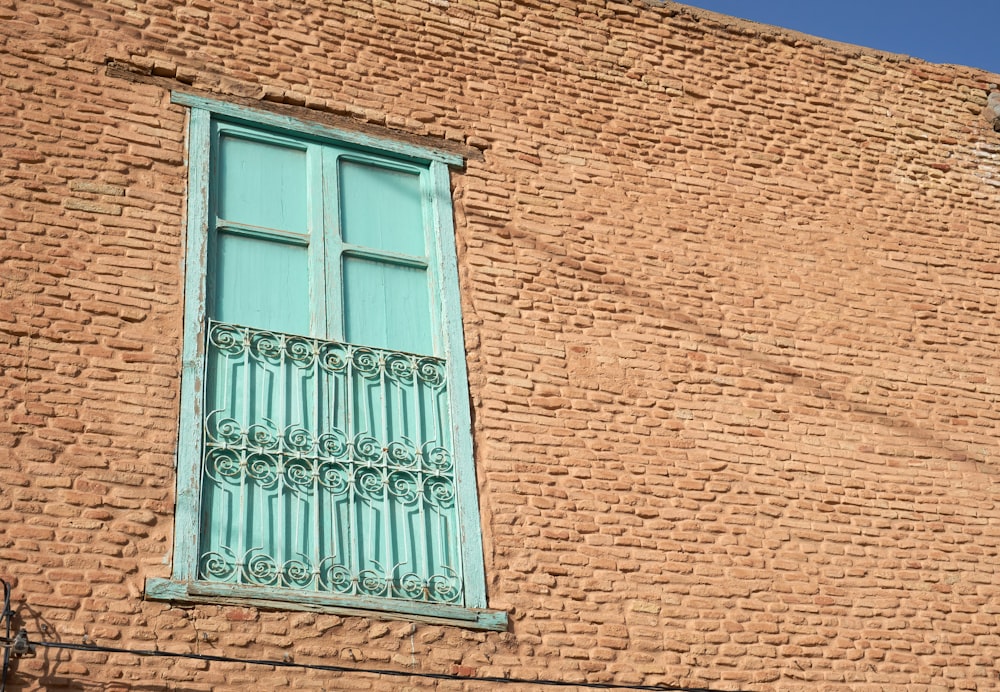 a window on a brick building
