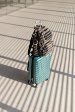 a couple of luggage bags on a table