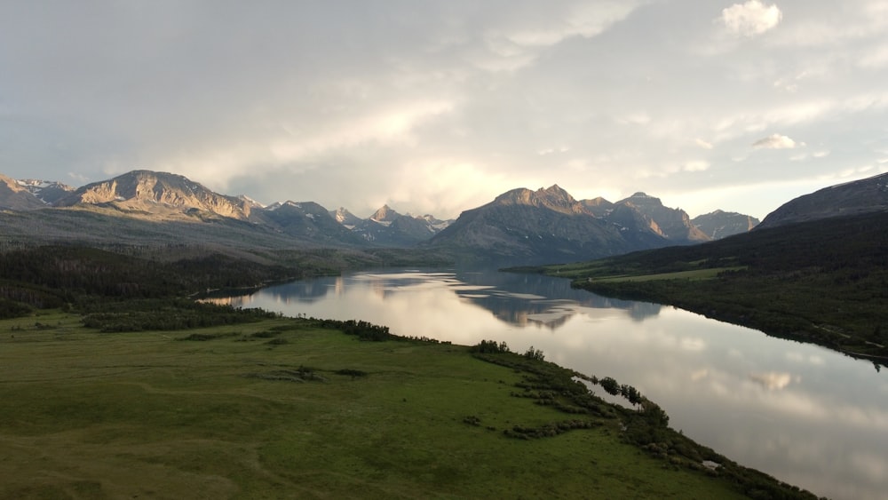 a lake surrounded by mountains