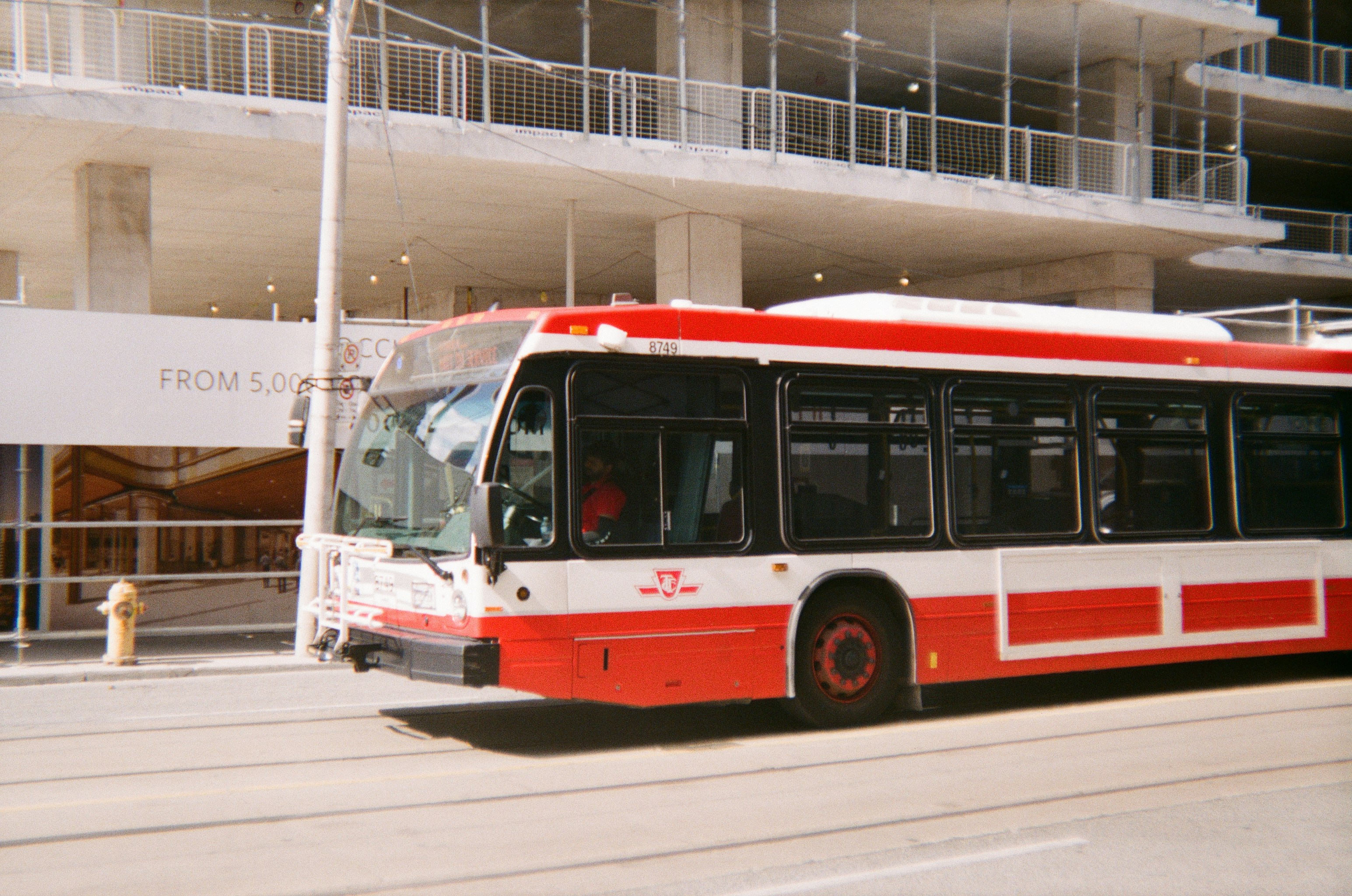 a bus parked in front of a building