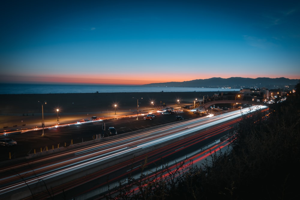 a highway with lights on at night