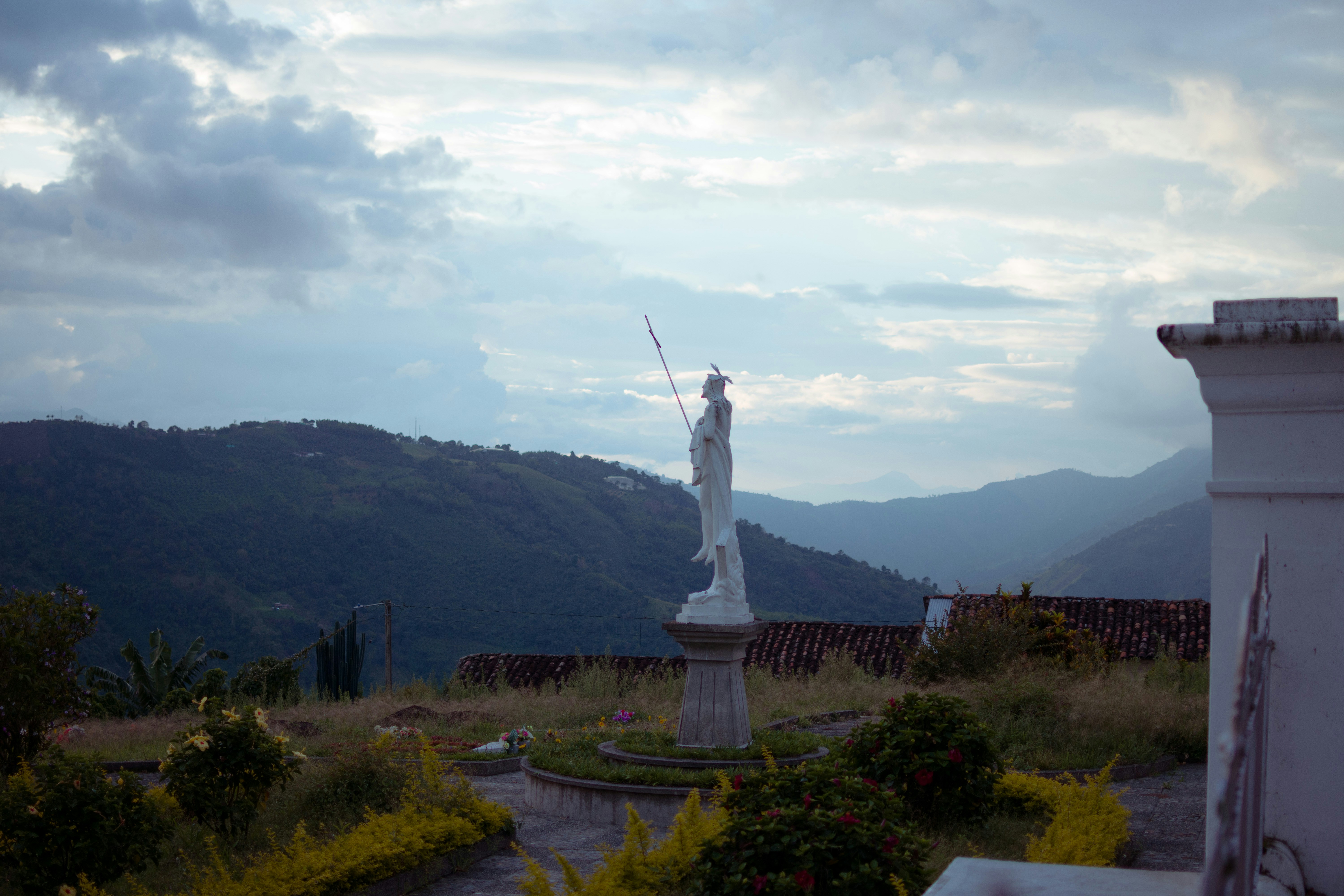 a statue in a garden