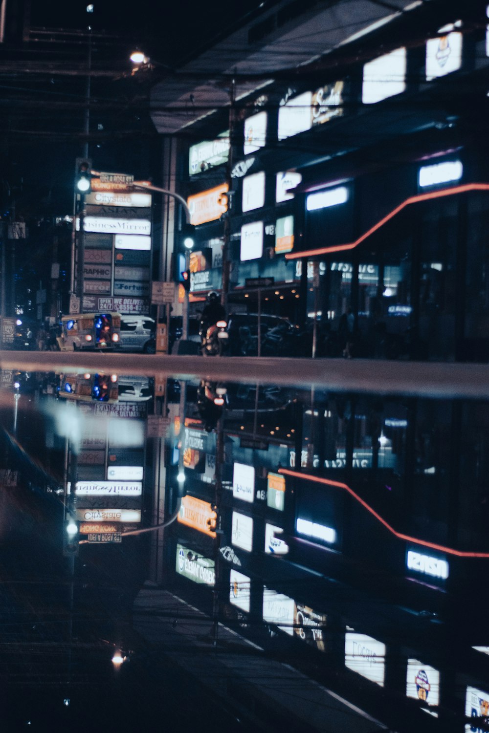 a street with signs and lights