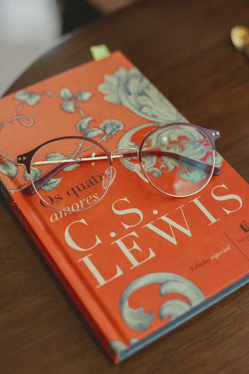 a book with glasses on it