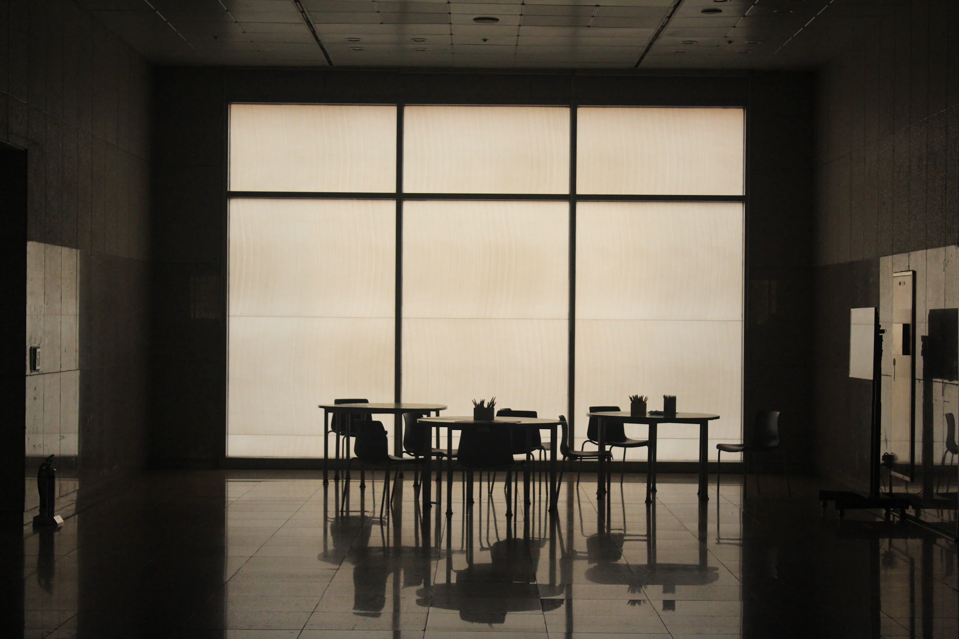 a room with a table and chairs