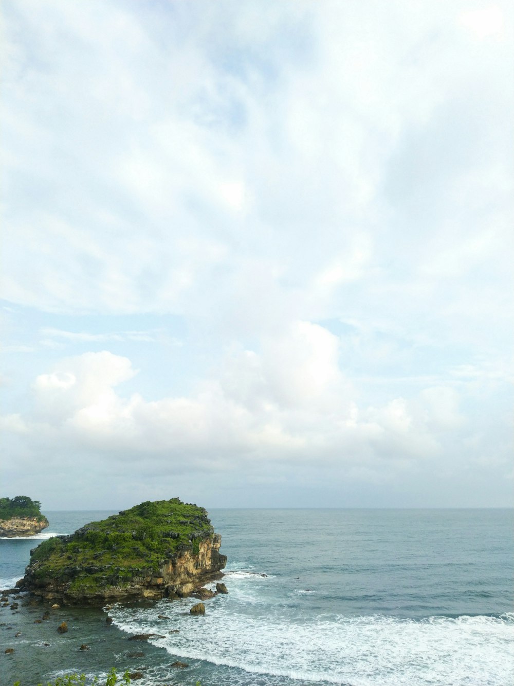 a body of water with land in the distance