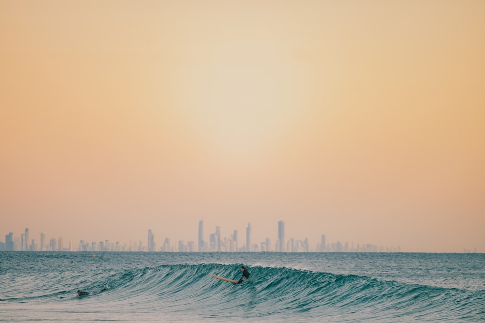 a person surfing in the sea