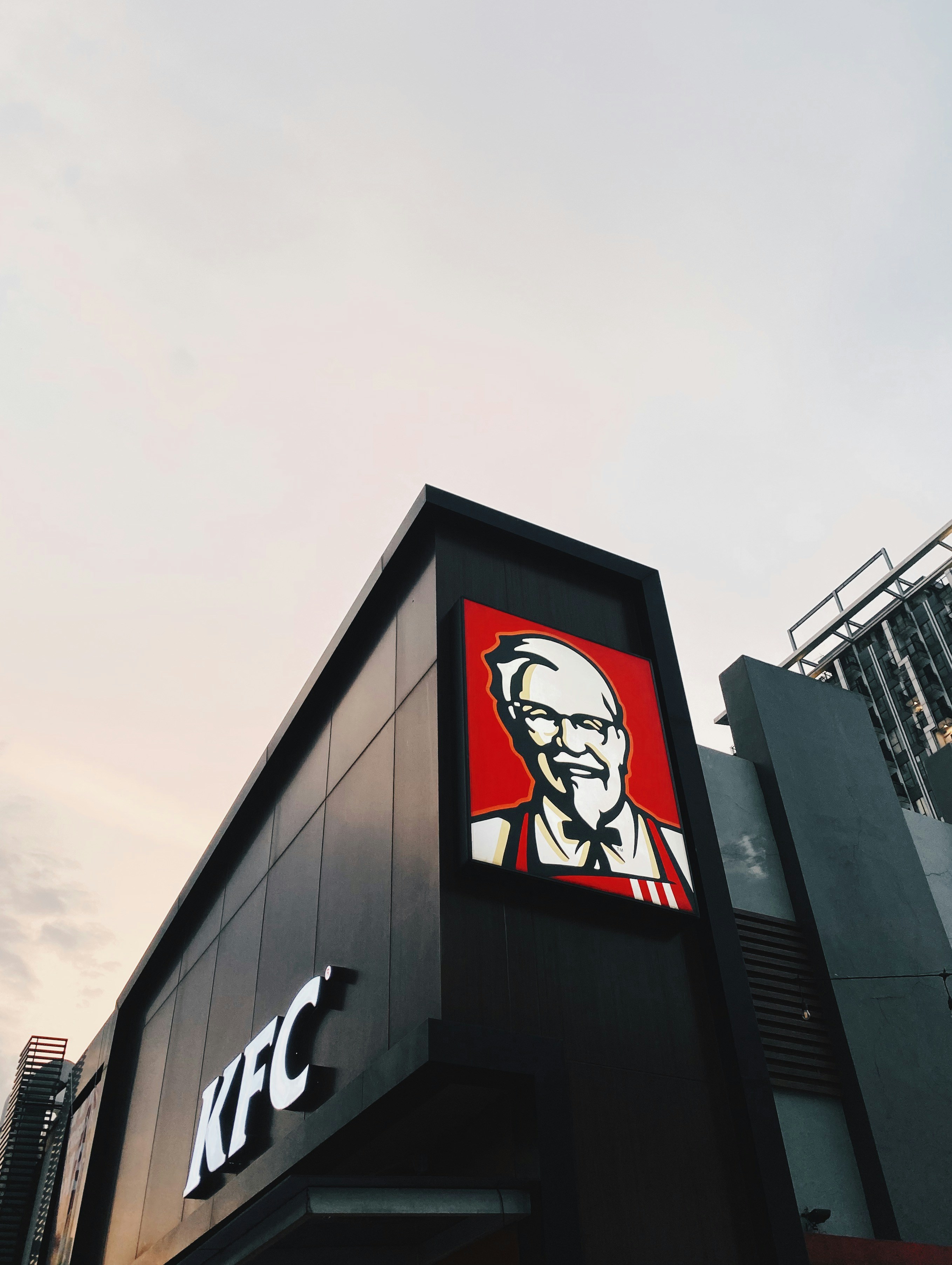 A building with a sign on it photo – Free Art Image on Unsplash