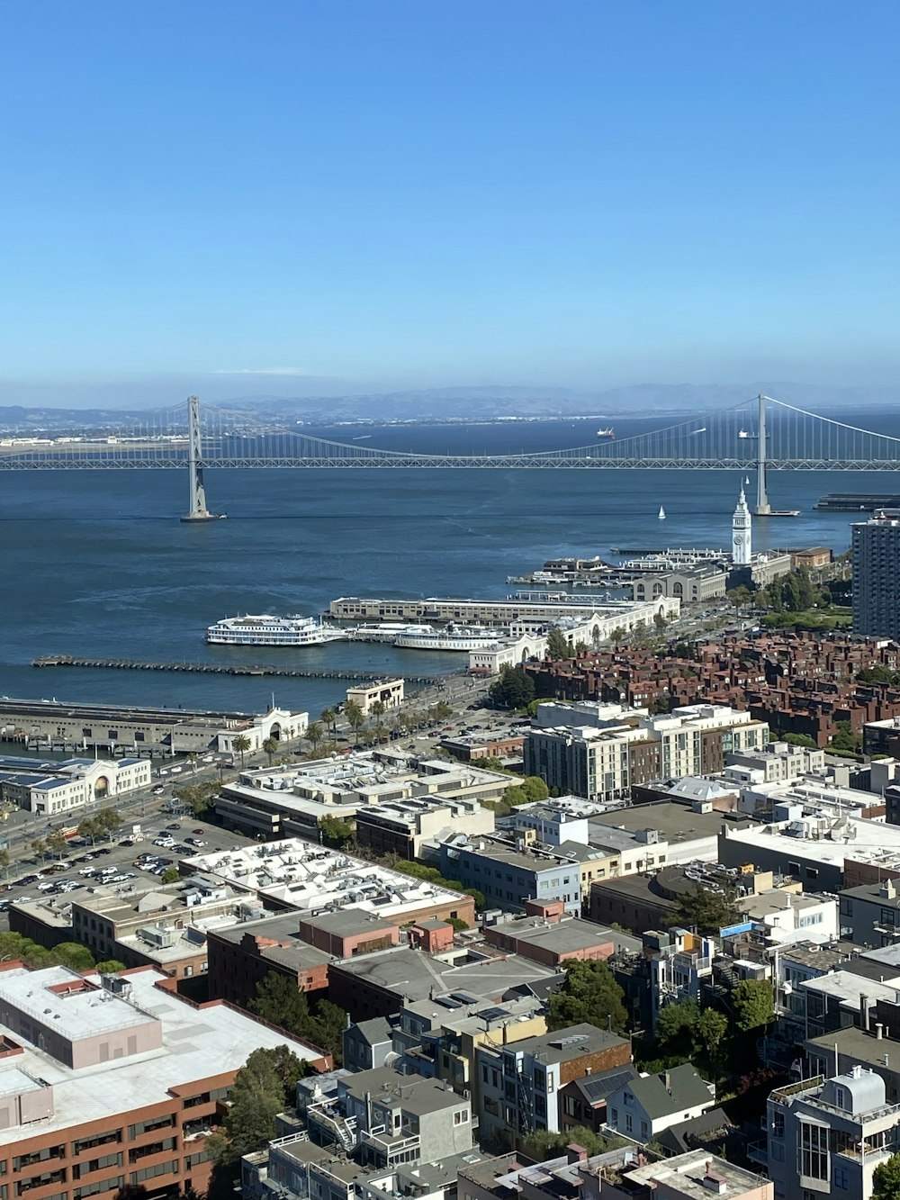 a city with a bridge and water