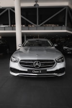 a silver car parked in a parking garage