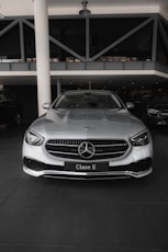 a silver car parked in a parking garage