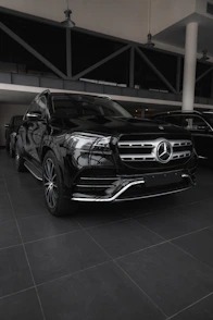 a black car parked in a building