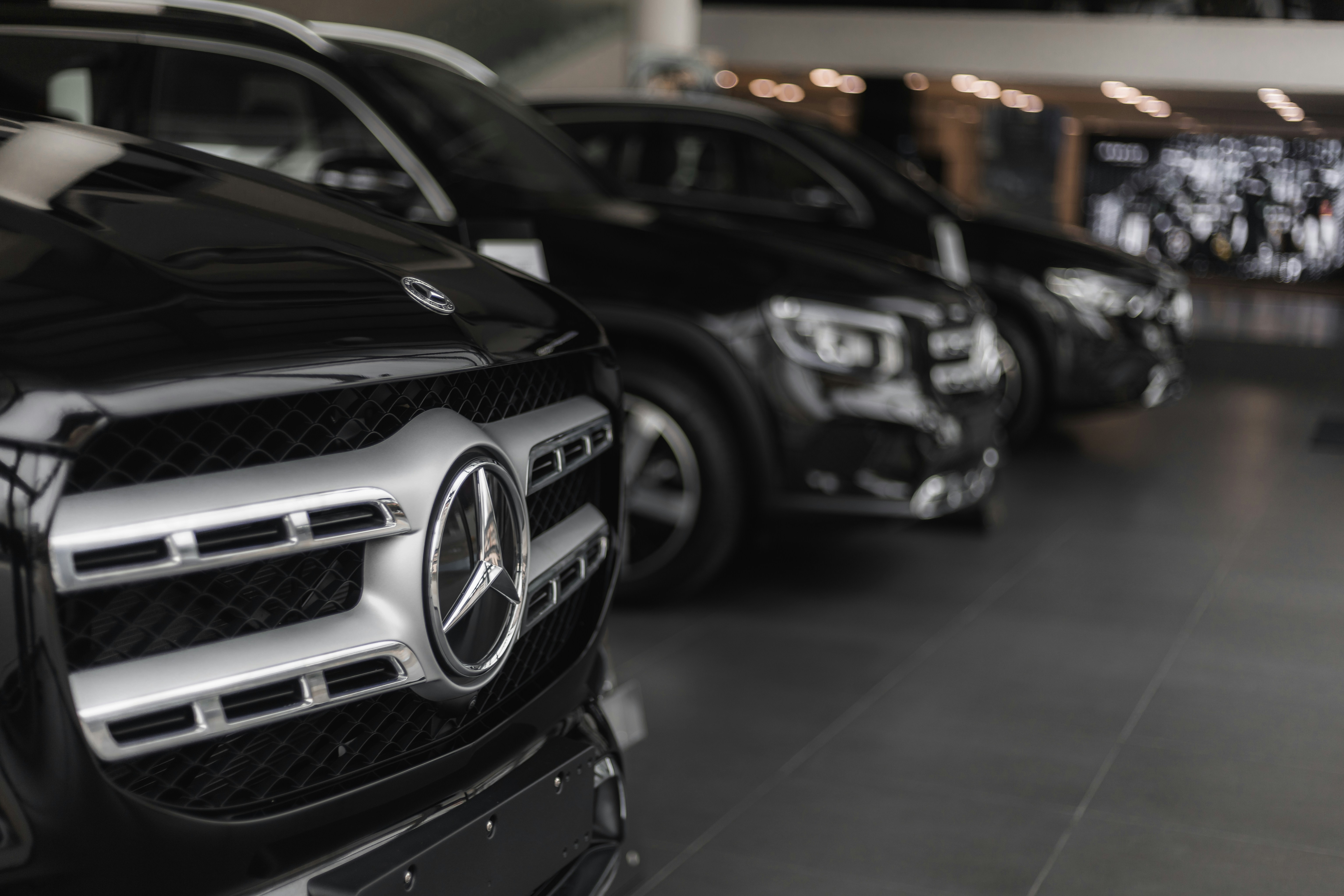 a row of cars parked in a parking garage