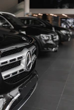 a row of cars parked in a parking garage