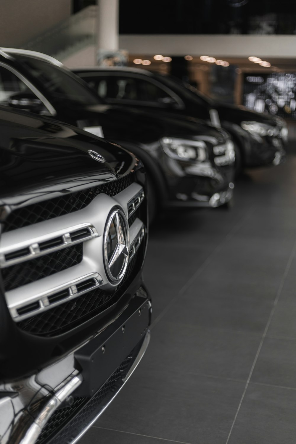 a row of cars parked in a parking garage