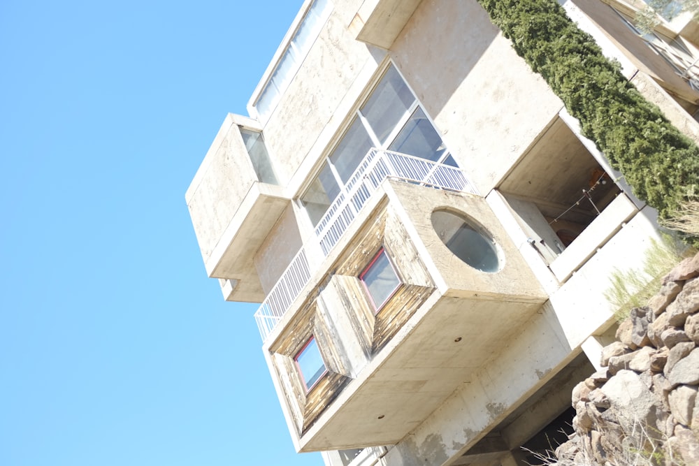 a white building with a round window