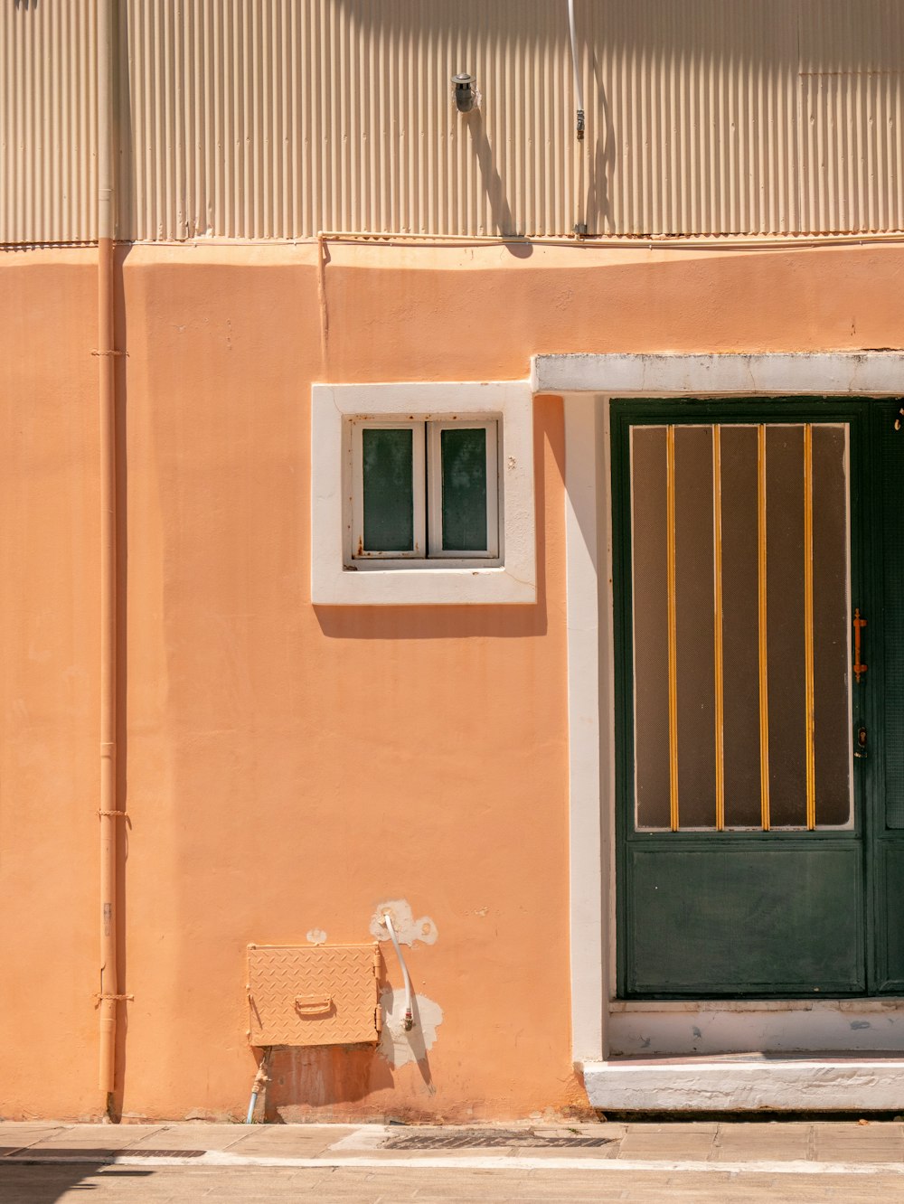 a suitcase sits outside of a building