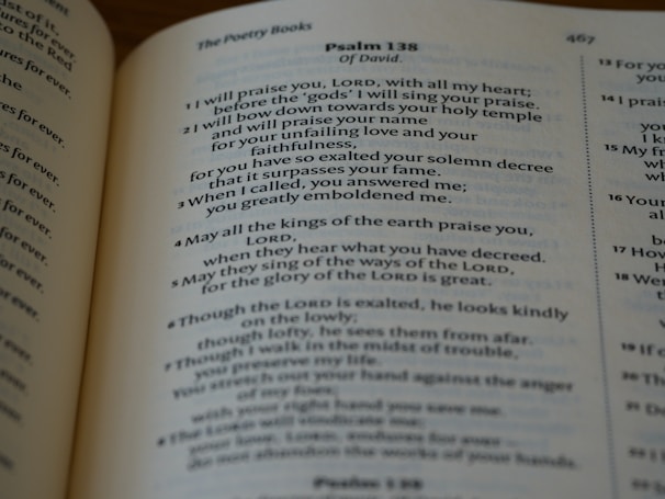 A close-up view of a page from a religious text, possibly a Bible, focusing on Psalm 138. The text is printed in a classic serif font on a slightly yellowed page, suggesting age or frequent use.