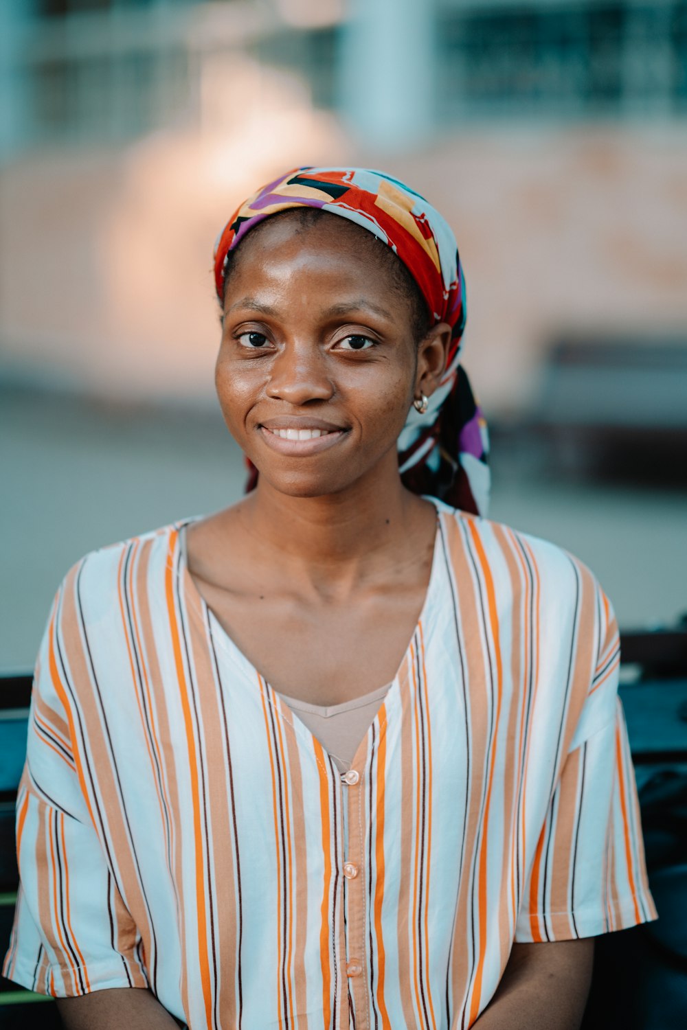 a person wearing a colorful headband