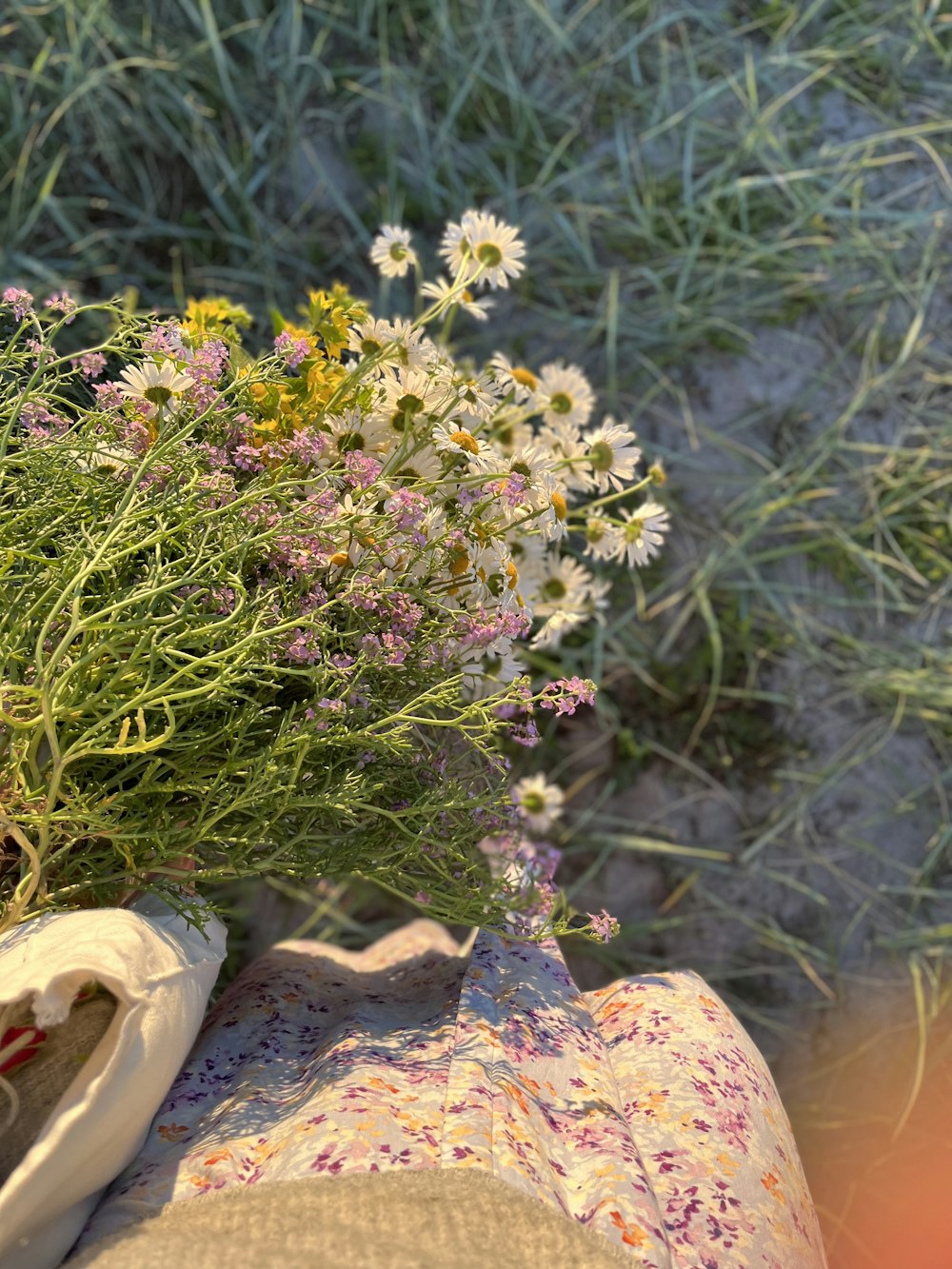 a person's feet in a garden