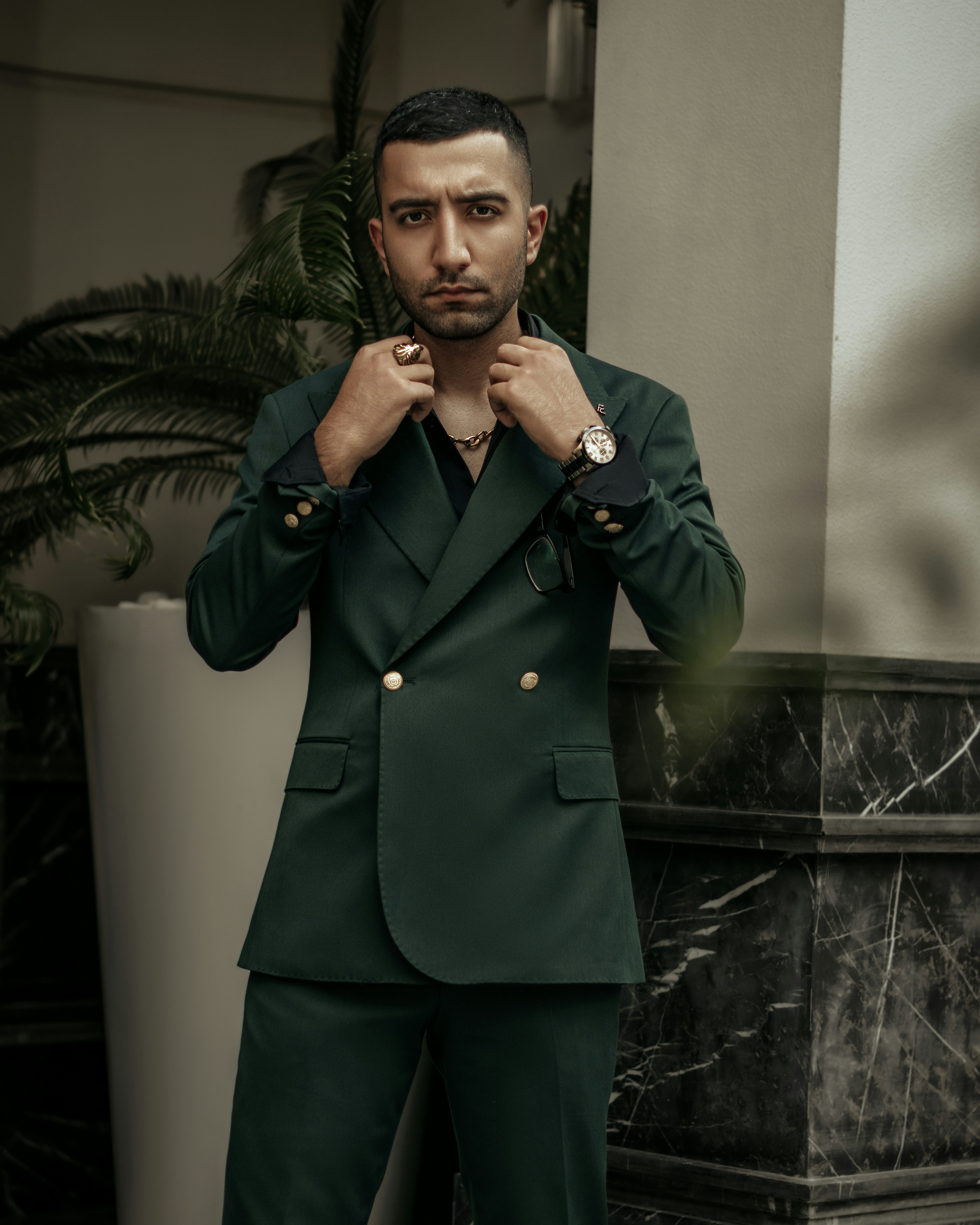 a person wearing a green jacket