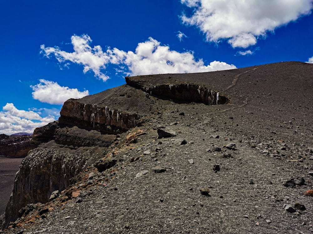 a rocky landscape with a blue sky