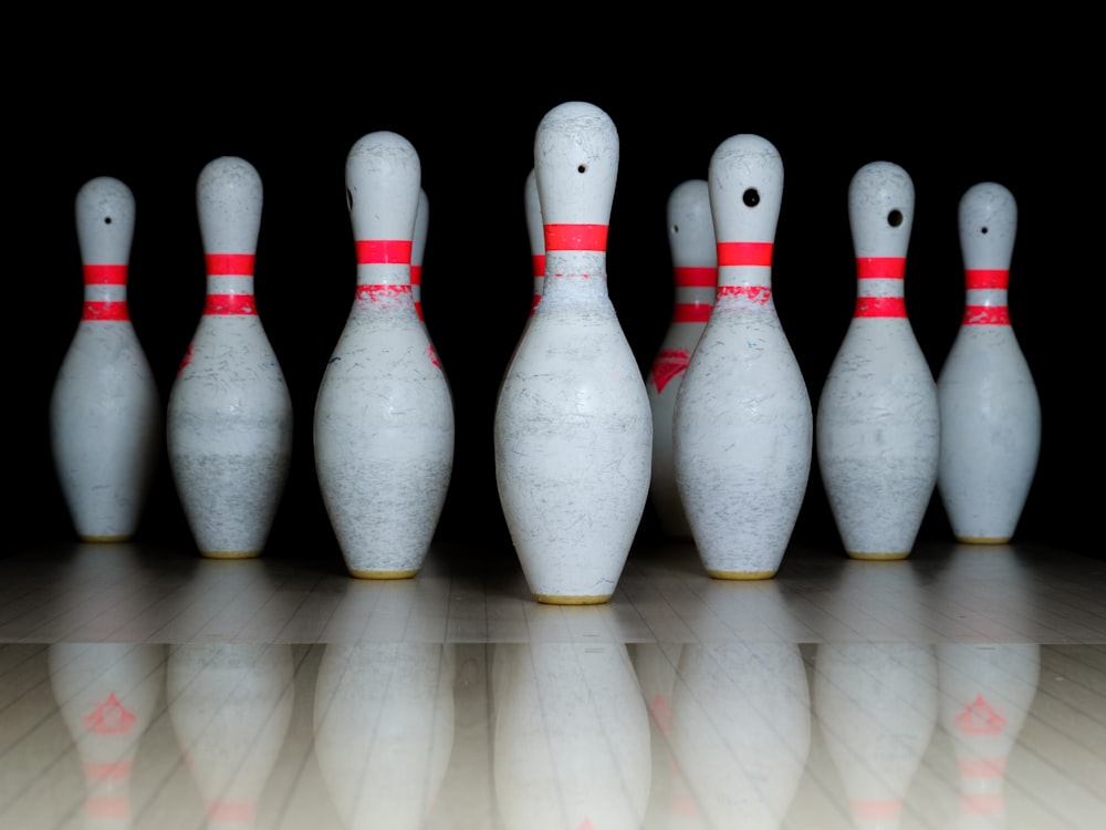 a group of white and red chess pieces