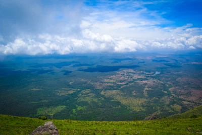 A sweeping landscape photo taken from a high vantage point, showcasing nature’s vastness.