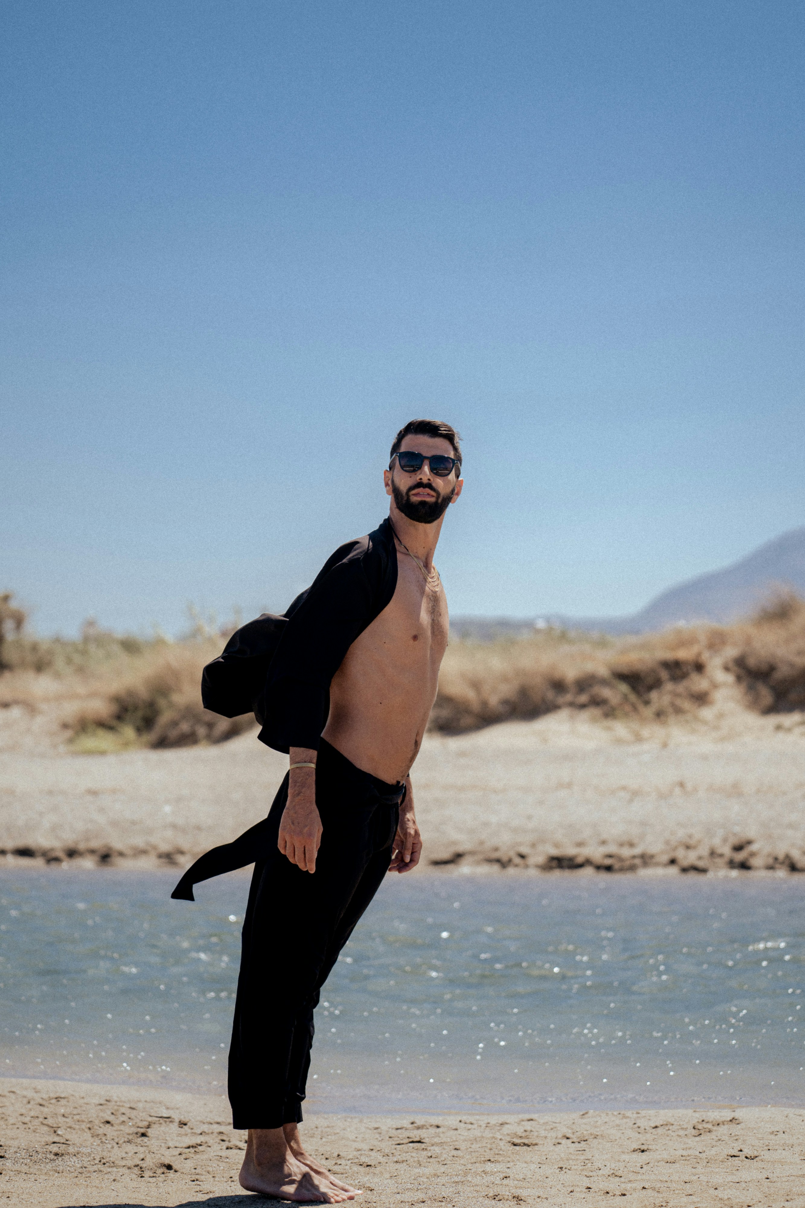 a man standing on a beach