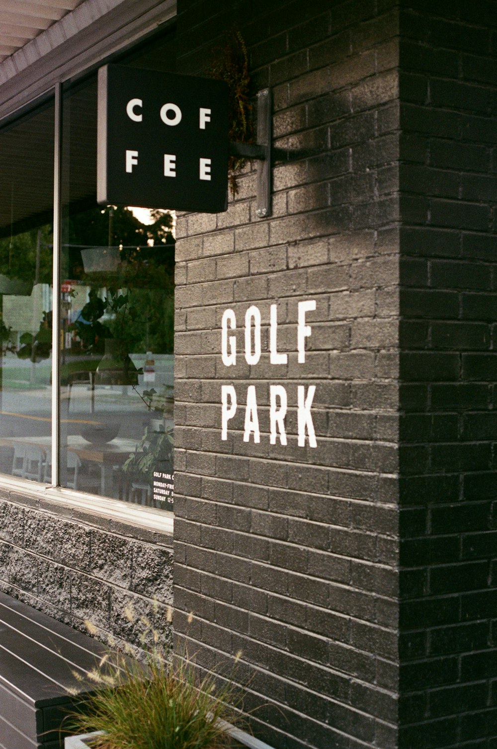 a sign on a brick building