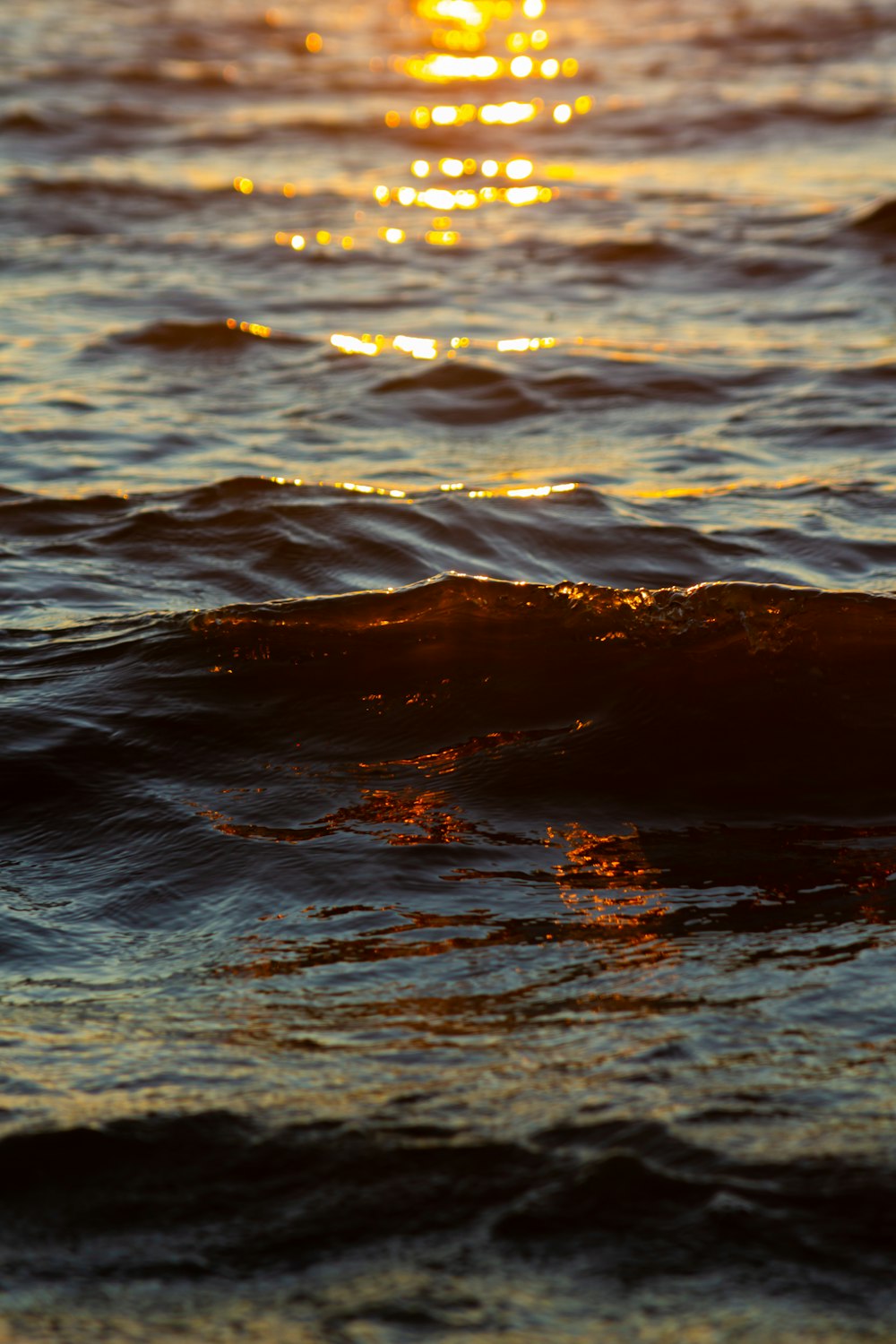 a sunset over a body of water