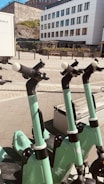 Electric motorcycles lined up ready for urban transportation.