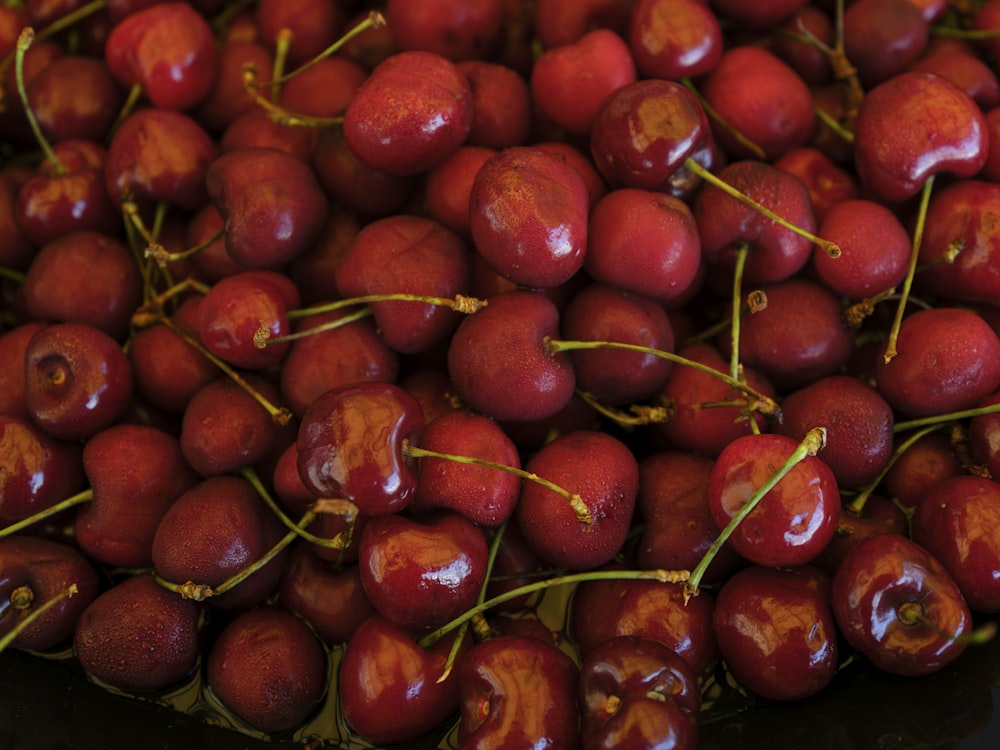 a pile of red tomatoes