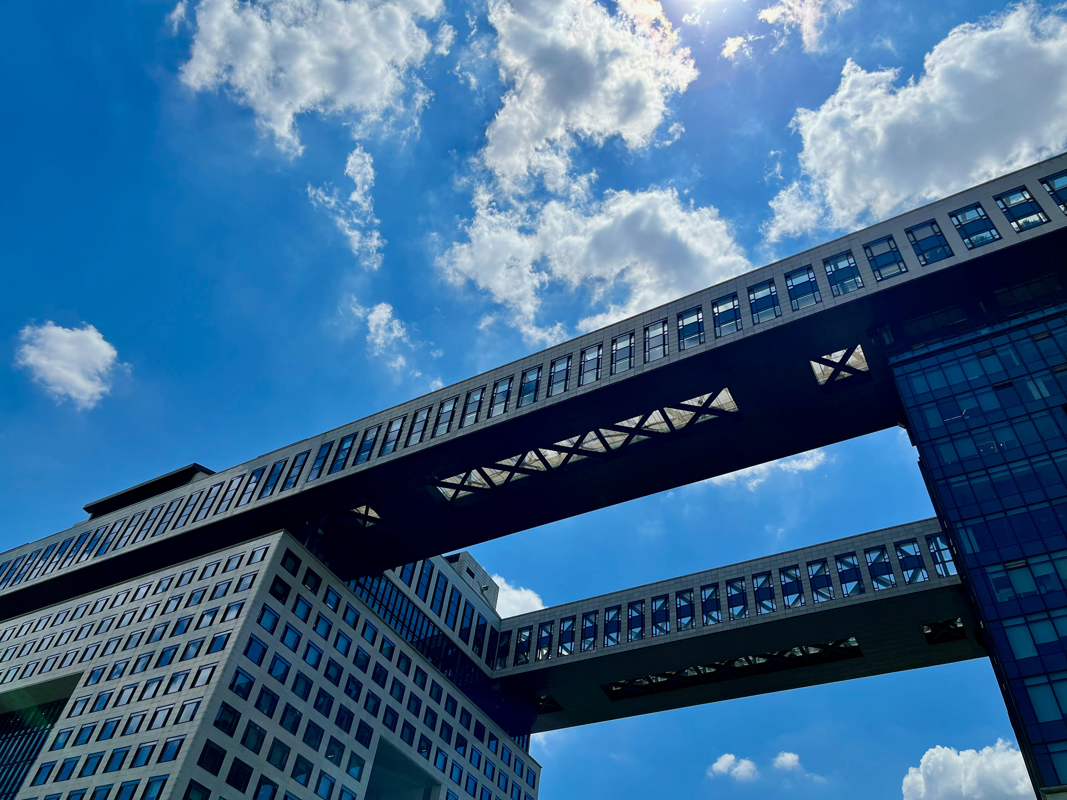 a bridge with a building in the background