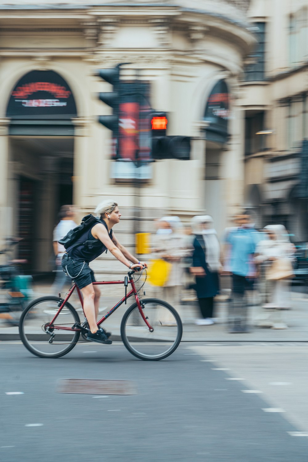 a person riding a bicycle on a street