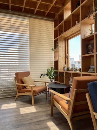 a room with chairs and a table