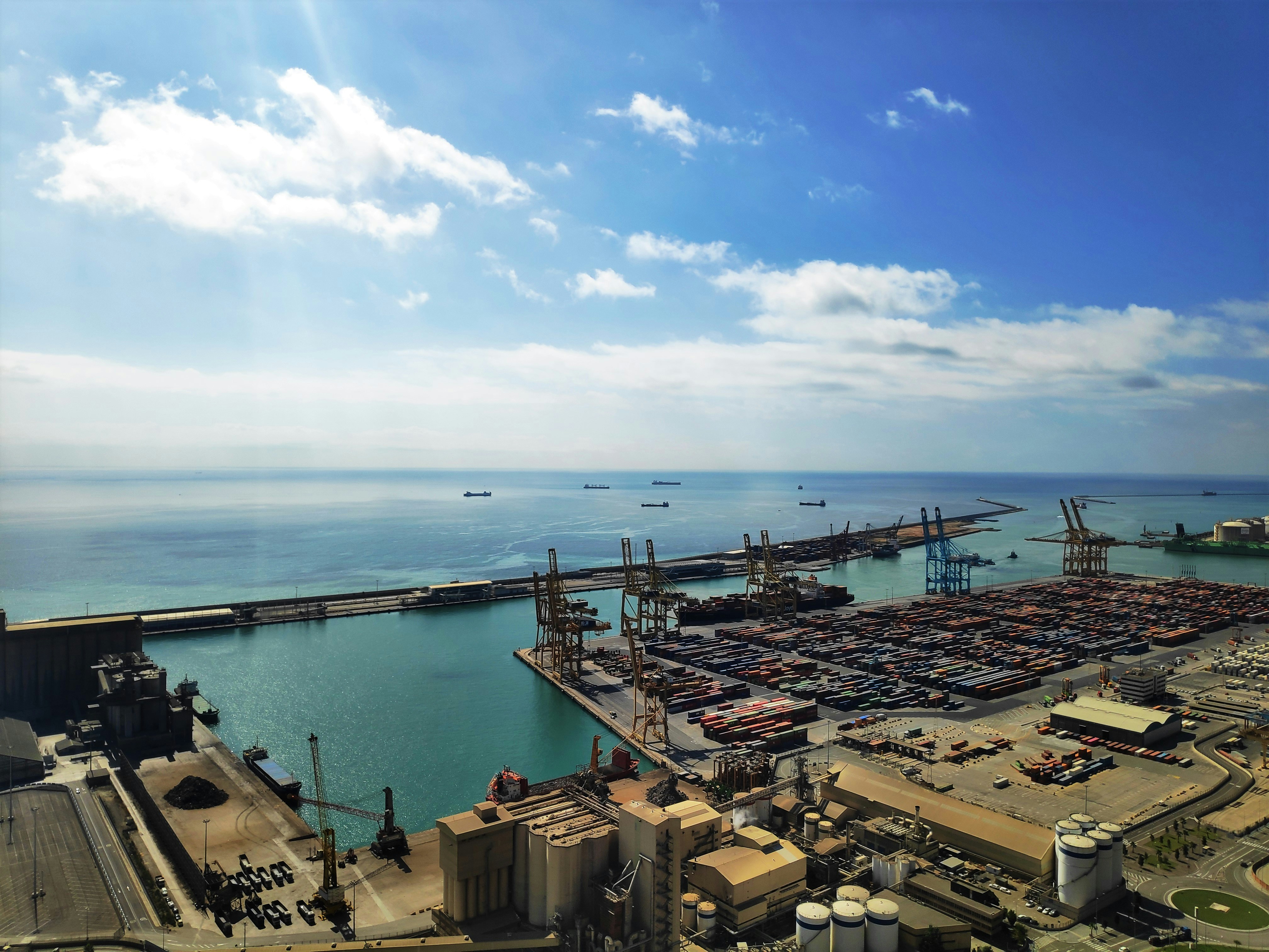 a port with a bridge and a body of water
