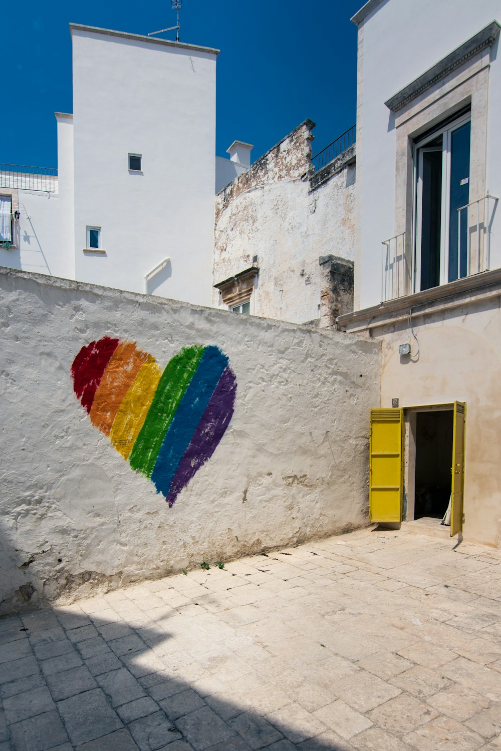 a building with a rainbow painted on it