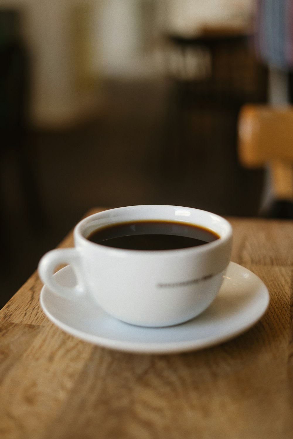 a cup of coffee on a saucer