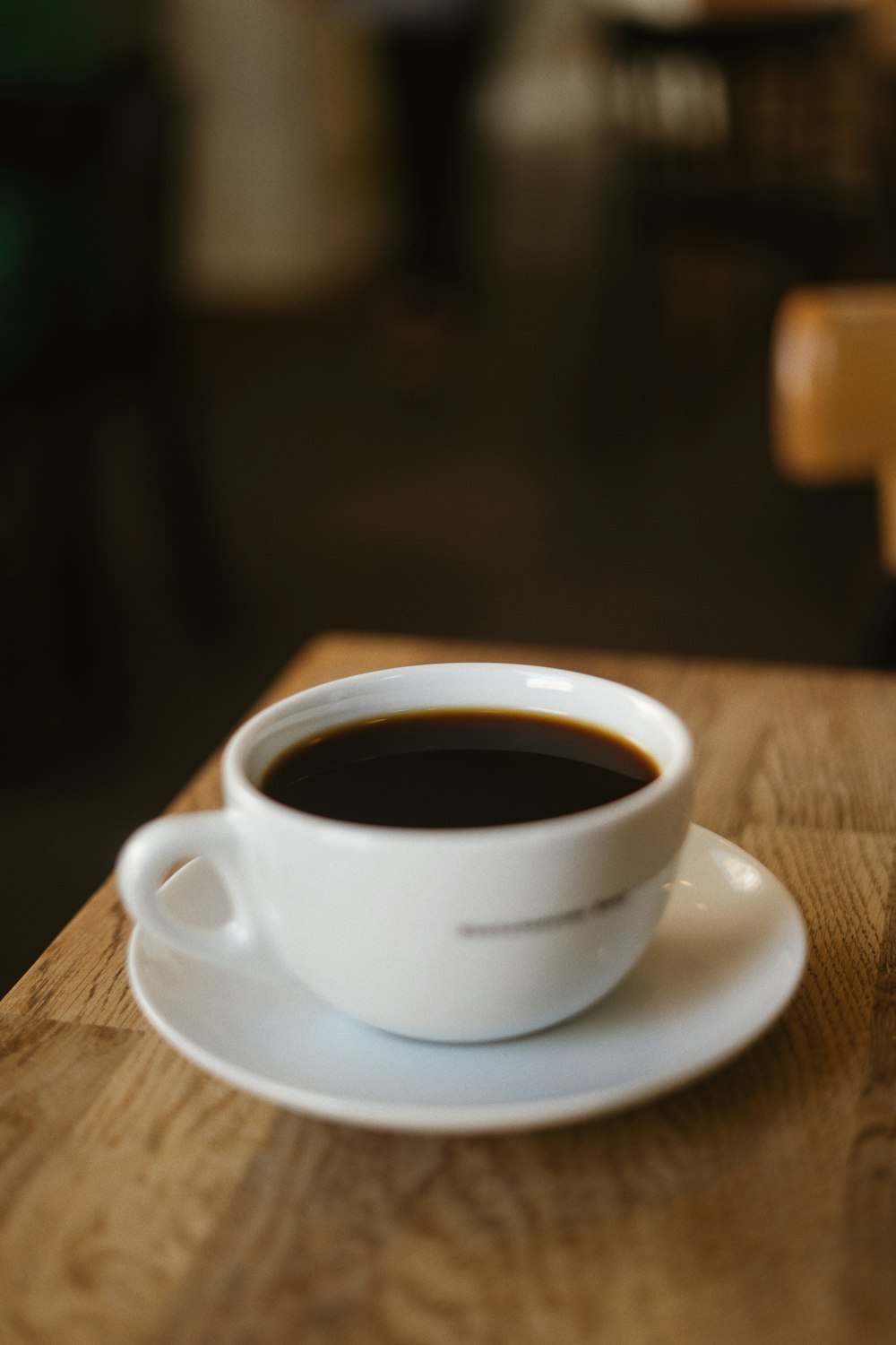 a cup of coffee on a saucer