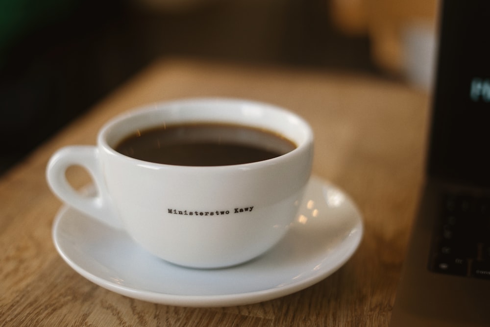 a cup of coffee on a saucer