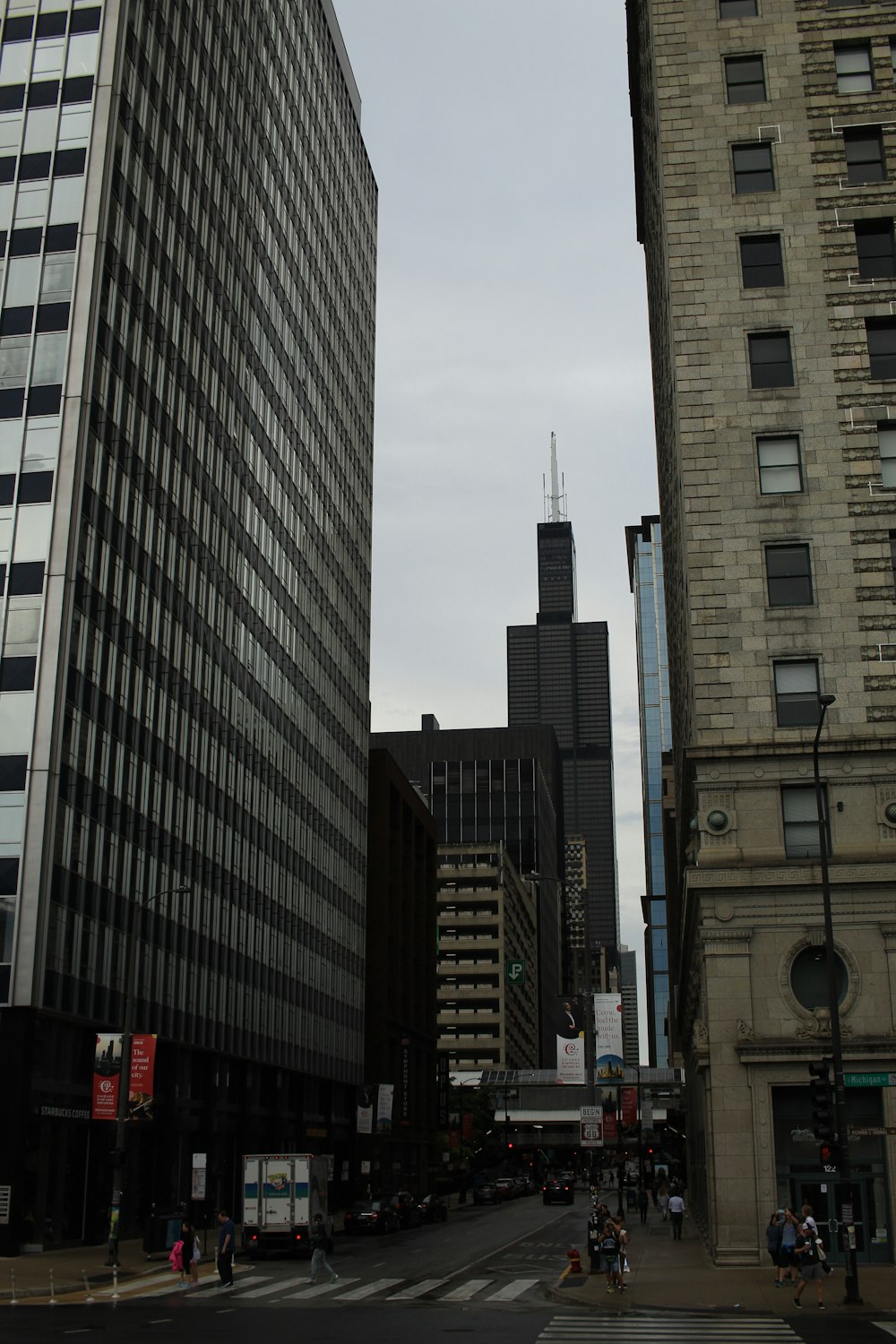 a city street with tall buildings