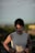 a person with a white tank top
