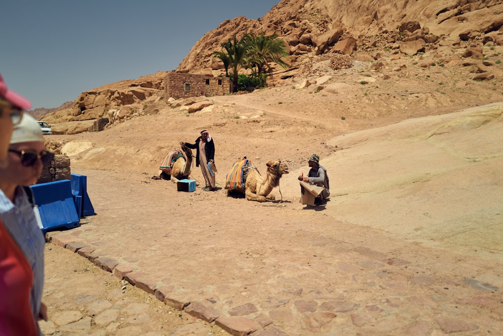 a group of people in a desert