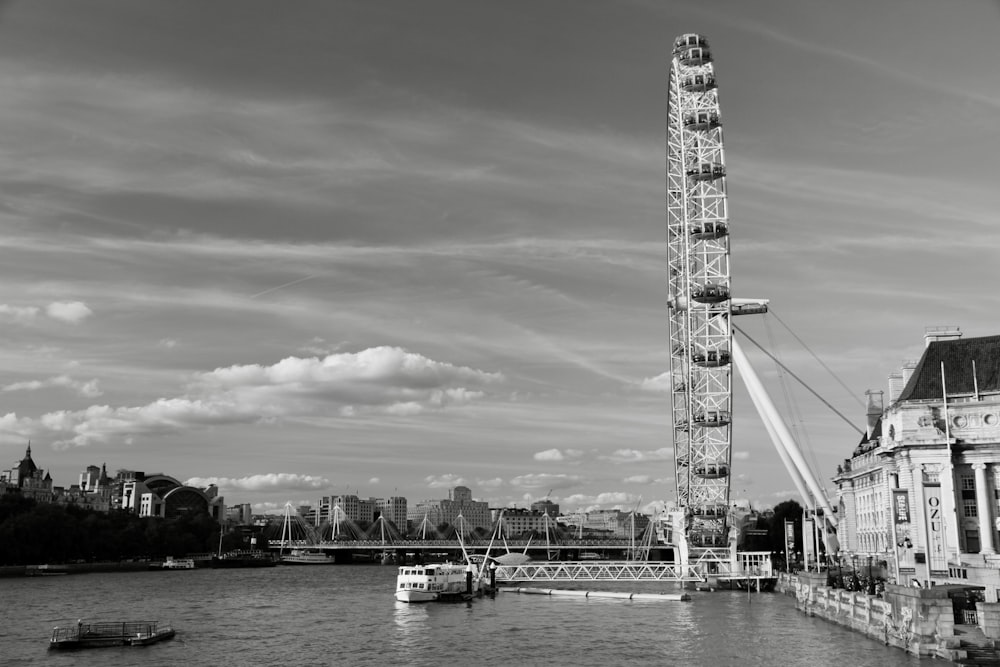 a large tower next to a river